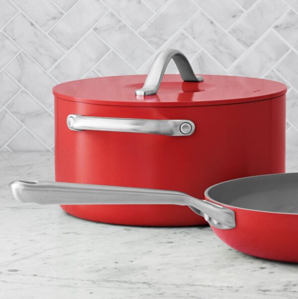 Ceramic Cookware Set Red 11-Piece Red Member's Mark Superior Nonstick Cookware Unlike traditional nonstick cookware, this set of pots and pans features ceramic nonstick interiors made without harmful chemicals like PTFE, PFOS or PFOA. Now you can enjoy superior nonstick performance with high release and easy cleaning after every meal. The impact-bonded honeycomb base makes this set safe for all stovetops, including induction. Plus, these pans are oven safe up to 450°F—talk about versatile! Nonstick Cooking with Less Oil and Butter The nonstick interiors of this cookware require little oil or butter while you're cooking for healthier meals that don't stick to the pans. The heavy-gauge aluminum construction delivers even heat distribution and long-lasting durability for years of cooking. Even Heating and Enhanced Flavor The specially designed cast aluminum lids have a curved shape for self-moistening circulation during cooking that protects food from drying out. The unique design gently cooks your dishes and enhances the flavors of the food during cooking. Care and Storage Dishwasher safe, though handwashing is recommended to extend the life of your cookware Pots, pans and lids are oven-safe to 450°F (232°C) Suitable for use on all cooktops, including induction To extend the life of your cookware, cook only on low to medium heat; never on extremely high heat as it can ruin the nonstick interiors