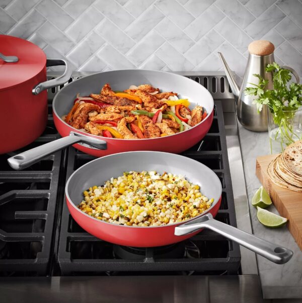 Ceramic Cookware Set Red 11-Piece Red Member's Mark Superior Nonstick Cookware Unlike traditional nonstick cookware, this set of pots and pans features ceramic nonstick interiors made without harmful chemicals like PTFE, PFOS or PFOA. Now you can enjoy superior nonstick performance with high release and easy cleaning after every meal. The impact-bonded honeycomb base makes this set safe for all stovetops, including induction. Plus, these pans are oven safe up to 450°F—talk about versatile! Nonstick Cooking with Less Oil and Butter The nonstick interiors of this cookware require little oil or butter while you're cooking for healthier meals that don't stick to the pans. The heavy-gauge aluminum construction delivers even heat distribution and long-lasting durability for years of cooking. Even Heating and Enhanced Flavor The specially designed cast aluminum lids have a curved shape for self-moistening circulation during cooking that protects food from drying out. The unique design gently cooks your dishes and enhances the flavors of the food during cooking. Care and Storage Dishwasher safe, though handwashing is recommended to extend the life of your cookware Pots, pans and lids are oven-safe to 450°F (232°C) Suitable for use on all cooktops, including induction To extend the life of your cookware, cook only on low to medium heat; never on extremely high heat as it can ruin the nonstick interiors