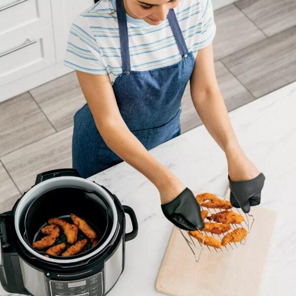 Ninja Foodi 10-in-1, 8 Quart XL Pressure Cooker Air Fryer Multicooker, Stainless, OS405 The XL Pressure Cooker That Crisps™ Features TenderCrisp™ Technology 8-quart pressure cooker with 10 programmable cooking functions Cooking pot and basket are nonstick and dishwasher safe XL Capacity: Fit up to a 7-lb. chicken The best of pressure cooking and air frying all in one XL pot. The Ninja® Foodi® 10-in-1 XL Pressure Cooker features TenderCrisp™ Technology to quickly pressure cook to lock in moisture and finish with a crisp. 10-in-1 versatility lets you cook endless meal options. XL 8-quart cooking pot holds a 7-lb. chicken and the Cook & Crisp™ Basket holds up to 4 lbs. of your guilt-free fried food favorites.