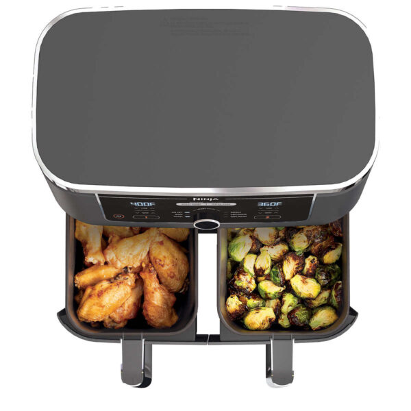 Ninja Foodi Air Fryer with DualZone Technology 6-in-1 10-qt. The Ninja® Foodi® 6-in-1 10-qt. XL 2-Basket Air Fryer with DualZone™ Technology and IQ Boost. This XL 10-qt. air fryer has 2 independent baskets that lets you cook 2 foods at once, no back-to-back cooking like a traditional single-basket air fryer. Ninja Foodi Air Fryer Product Features: The XL air fryer with 2 independent baskets that lets you cook 2 foods, 2 ways, at the same time, not back-to-back like a traditional single-basket air fryer. DualZone™ Technology includes the Smart Finish feature for cooking 2 foods 2 ways that finish at the same time, and the Match Cook feature, which easily copies settings across zones for full 10-qt. capacity. IQ Boost optimally distributes power across each basket to cook a 6-lb. whole chicken and side as quickly as possible when Match Cook or Smart Finish is not selected. 6 versatile cooking programs: Air Fry, Keep Warm, Roast, Bake, Reheat, and Dehydrate. XL 10-qt. capacity and 2 baskets, you can whip up a main and a side at the same time for quick large family meals, or up to 8 lbs. of chicken wings. 2 independent 5-qt. zones have their own cooking baskets, cyclonic fans, and rapid heaters. Easy-to-clean baskets and dishwasher-safe crisper plates. Wide temperature range: 105°F–400°F. Up to 75% less fat than traditional air frying methods. *Tested against hand-cut, deep fried French fries Cooks two 6-lb. chickens up to 30% faster than a traditional oven. Accessories Included: 1690-watt main unit with 6 programmable cooking functions Two 5-qt cooking baskets for 10-qt capacity 2 nonstick crisper plates 15 chef-inspired recipes & cooking charts Dimensions & More: Type of material: Plastic LxWxH: 17” Lx 13.9” x 13” Weight: 19.75 Lbs 1690-Watts, 120-Volts