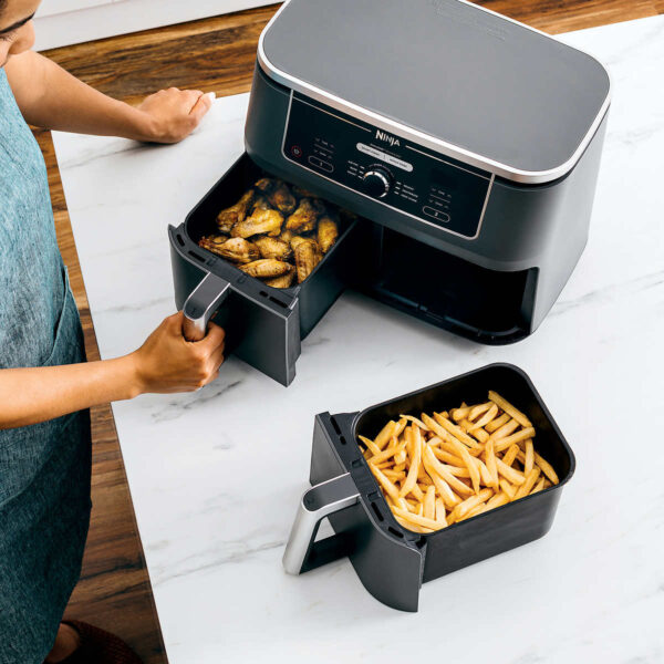 Ninja Foodi Air Fryer with DualZone Technology 6-in-1 10-qt. The Ninja® Foodi® 6-in-1 10-qt. XL 2-Basket Air Fryer with DualZone™ Technology and IQ Boost. This XL 10-qt. air fryer has 2 independent baskets that lets you cook 2 foods at once, no back-to-back cooking like a traditional single-basket air fryer. Ninja Foodi Air Fryer Product Features: The XL air fryer with 2 independent baskets that lets you cook 2 foods, 2 ways, at the same time, not back-to-back like a traditional single-basket air fryer. DualZone™ Technology includes the Smart Finish feature for cooking 2 foods 2 ways that finish at the same time, and the Match Cook feature, which easily copies settings across zones for full 10-qt. capacity. IQ Boost optimally distributes power across each basket to cook a 6-lb. whole chicken and side as quickly as possible when Match Cook or Smart Finish is not selected. 6 versatile cooking programs: Air Fry, Keep Warm, Roast, Bake, Reheat, and Dehydrate. XL 10-qt. capacity and 2 baskets, you can whip up a main and a side at the same time for quick large family meals, or up to 8 lbs. of chicken wings. 2 independent 5-qt. zones have their own cooking baskets, cyclonic fans, and rapid heaters. Easy-to-clean baskets and dishwasher-safe crisper plates. Wide temperature range: 105°F–400°F. Up to 75% less fat than traditional air frying methods. *Tested against hand-cut, deep fried French fries Cooks two 6-lb. chickens up to 30% faster than a traditional oven. Accessories Included: 1690-watt main unit with 6 programmable cooking functions Two 5-qt cooking baskets for 10-qt capacity 2 nonstick crisper plates 15 chef-inspired recipes & cooking charts Dimensions & More: Type of material: Plastic LxWxH: 17” Lx 13.9” x 13” Weight: 19.75 Lbs 1690-Watts, 120-Volts