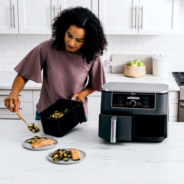 Ninja Foodi Air Fryer with DualZone Technology 6-in-1 10-qt. The Ninja® Foodi® 6-in-1 10-qt. XL 2-Basket Air Fryer with DualZone™ Technology and IQ Boost. This XL 10-qt. air fryer has 2 independent baskets that lets you cook 2 foods at once, no back-to-back cooking like a traditional single-basket air fryer. Ninja Foodi Air Fryer Product Features: The XL air fryer with 2 independent baskets that lets you cook 2 foods, 2 ways, at the same time, not back-to-back like a traditional single-basket air fryer. DualZone™ Technology includes the Smart Finish feature for cooking 2 foods 2 ways that finish at the same time, and the Match Cook feature, which easily copies settings across zones for full 10-qt. capacity. IQ Boost optimally distributes power across each basket to cook a 6-lb. whole chicken and side as quickly as possible when Match Cook or Smart Finish is not selected. 6 versatile cooking programs: Air Fry, Keep Warm, Roast, Bake, Reheat, and Dehydrate. XL 10-qt. capacity and 2 baskets, you can whip up a main and a side at the same time for quick large family meals, or up to 8 lbs. of chicken wings. 2 independent 5-qt. zones have their own cooking baskets, cyclonic fans, and rapid heaters. Easy-to-clean baskets and dishwasher-safe crisper plates. Wide temperature range: 105°F–400°F. Up to 75% less fat than traditional air frying methods. *Tested against hand-cut, deep fried French fries Cooks two 6-lb. chickens up to 30% faster than a traditional oven. Accessories Included: 1690-watt main unit with 6 programmable cooking functions Two 5-qt cooking baskets for 10-qt capacity 2 nonstick crisper plates 15 chef-inspired recipes & cooking charts Dimensions & More: Type of material: Plastic LxWxH: 17” Lx 13.9” x 13” Weight: 19.75 Lbs 1690-Watts, 120-Volts