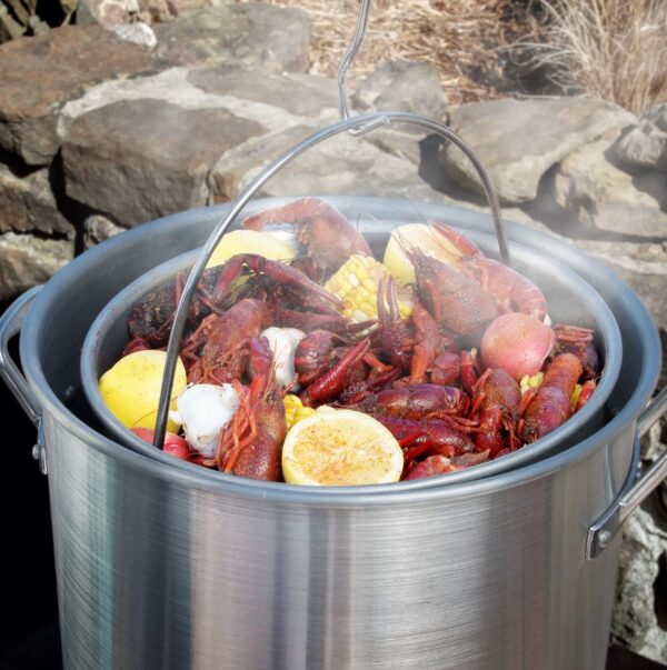 Member's Mark Complete Fry and Boil Kit Complete Fry and Boil Kit with 10-quart pan and basket is the ideal solution for event cooking, at camp, at the beach, or for occasions at home. Everything is included for the ultimate outdoor event, a 36-quart pot, strainer basket, lifter, thermometer and fish cooker. The kit features a welded stand for years of dependable service and the manufactured stamped steel burner provides consistent flames and performance. This fryer kit has an auto shut-off safety timer that automatically turns the fryer off if unattended after 15 minutes. The 5-PSIG hose provides high heat for quickly heating oil for frying or water for boiling. The strainer basket is ideal for seafood or crawfish boils and does a great job with corn and other vegetables. The 10-quart fryer pan is the ideal size for fish fries and the strainer basket allows for grease to be drained off after the food is cooked. The fryer kit features a 15" thermometer included with heat zones that let you know what temperature the oil is in the pot. The complete fry and boil kit 36 has a 38,000 BTU burner and is CSA approved. Fry and boil kit 36-quart pot with lifter, basket and lid 10-quart frying pot with basket Welded heavy-duty LP 36-quart pot and strainer 10-quart strainer basket 15" thermometer Aluminum pot steel stand CSA approved Safety auto shut off timer