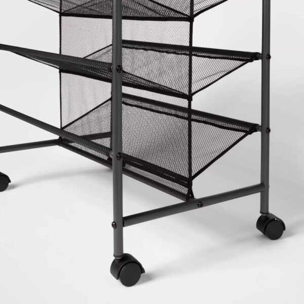 Double Sided Rolling Shoe Rack Black - Room Essentials™ Keep your shoes neatly organized and off the floor with the Double Sided Rolling Shoe Rack from Room Essentials™. Crafted from solid steel for durability and lasting use, this black metal shoe closet features a double-sided shelf design that can easily hold up to 30 pairs of shoes. The breathable mesh lining offers ample ventilation and keeps the shoes from falling out of the rack, while the attached rolling casters make it easy to move it from one room to another. Perfect for organizing men's, women's or kids shoes, this portable shoe closet offers ample space to accommodate different styles of shoes while easily blending with any style of decor.